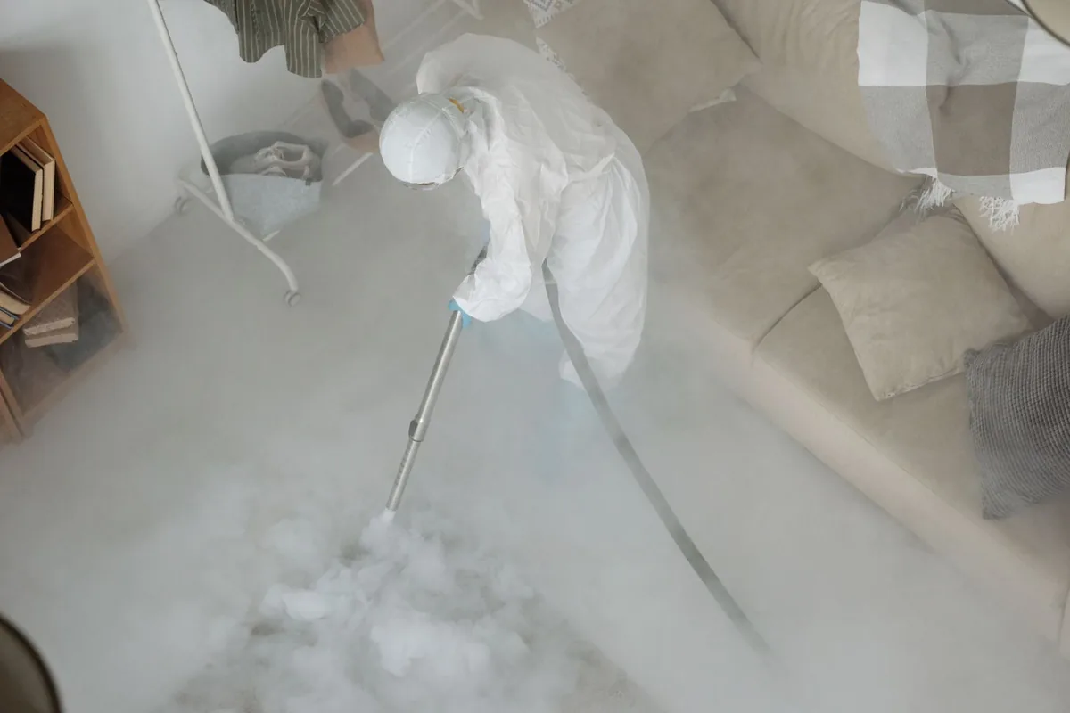 Biohazard cleanup technician in protective equipment, Cherry Grove, OH